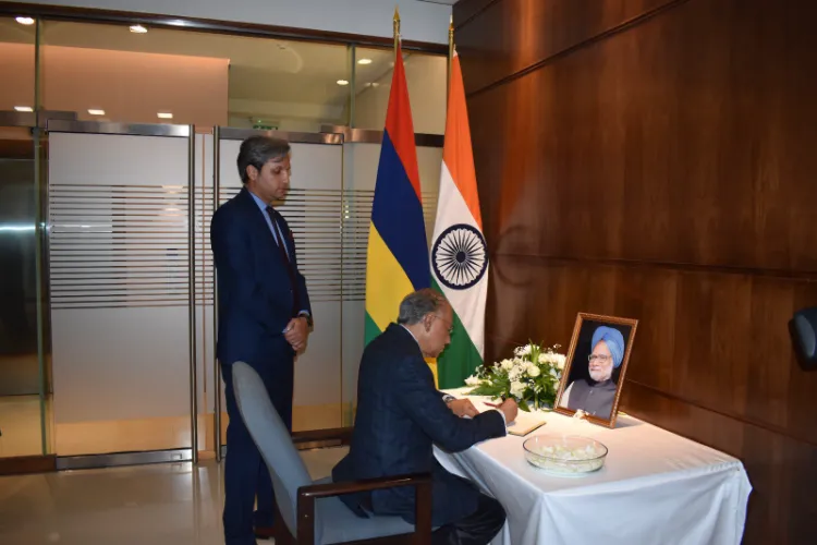 Dr. Ramgoolam , Prime Minister of Mauritius signed the Condolence Book opened in memory of Dr. Manmohan Singh, former Prime Minister of India