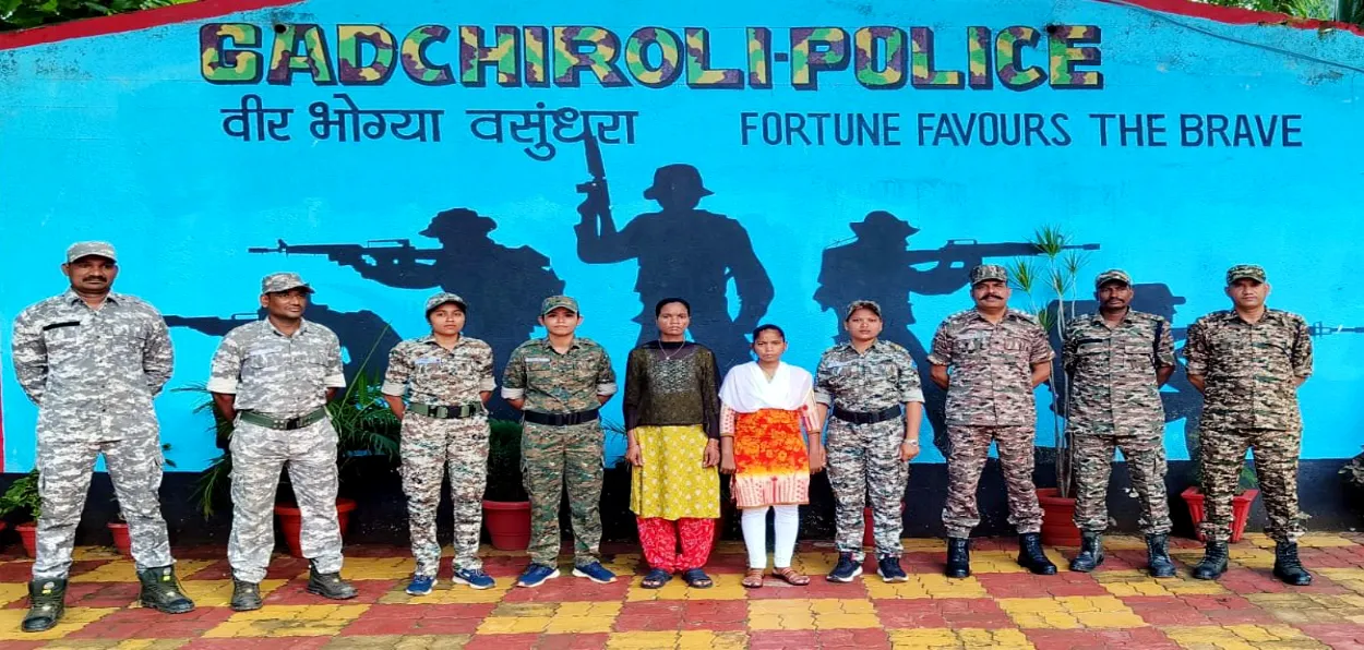 Women members of Naxal groups surrendering their weapons before the CRPF in Gharchiroli