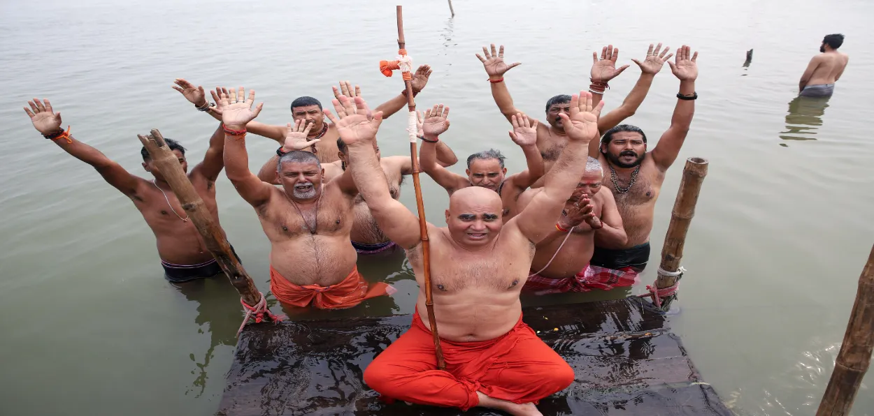 Chief of various Akharas take dip at the confluence of Sangam on the first day of the Maha Kumbh on Monday 