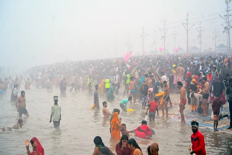 Devotees taking a dip in Sangam, Praygraj