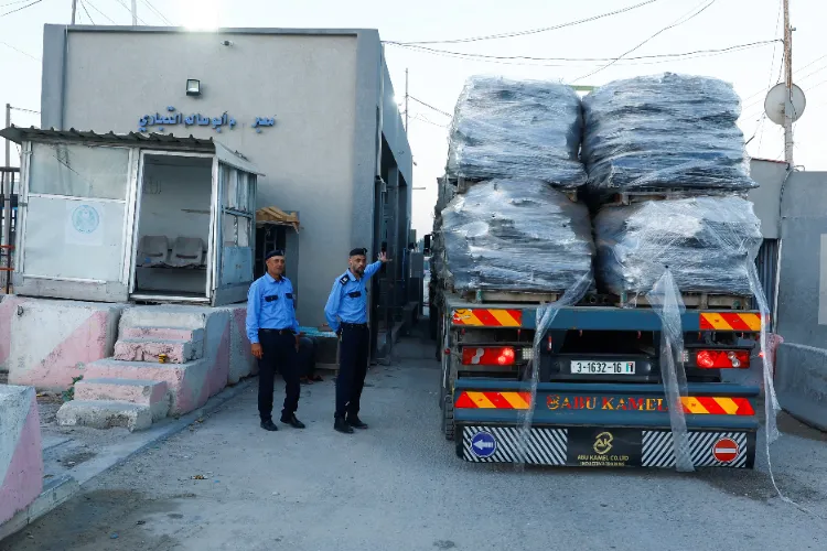 First aid trucks enter Gaza from Egypt as ceasefire takes effect