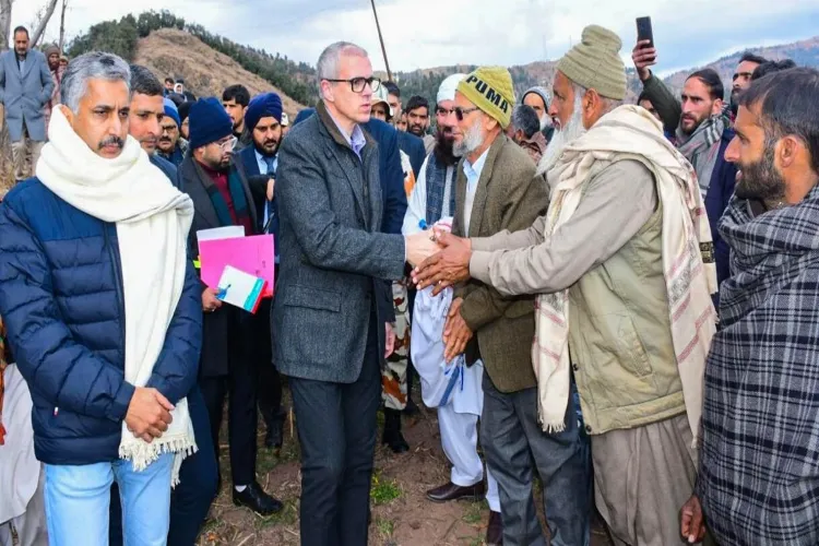 Jammu and Kashmir Chief Minister Omar Abdullah during his visit to Budhal village, where 16 died due to a mysterious illness, in Rajouri on Tuesday