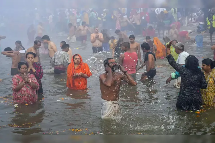 Devotees take holy bath on Basant Panchami at Sangam, Prayagraj