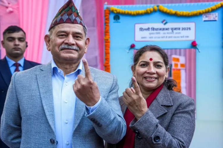 Army Chief General Upendra Dwivedi and his wife Sunita Dwivedi show their inked fingers after casting their votes 