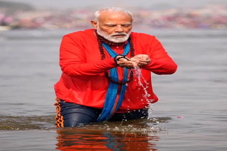 PM Narendra Modi takes a holy dip at Sangam in Prayagraj