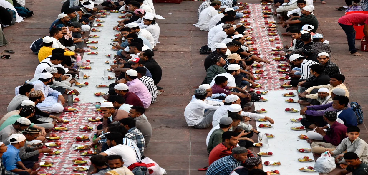 Muslims breaking fast during Ramazan