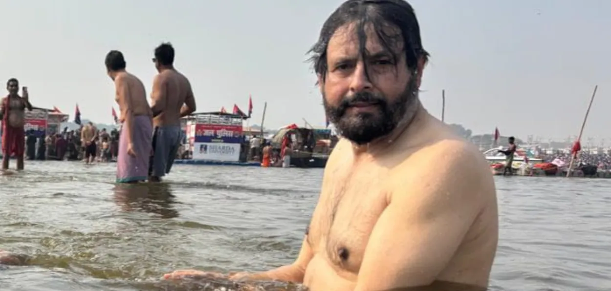 Advocate Raja Ashraf Ali taking a dip in Triveni Sangam 