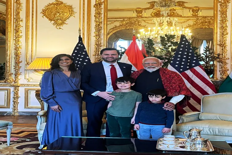 PM Modi in a group picture with US Vice President JD Vance and his wife Usha Vance and their children at Elysee Palace in Paris on Tuesday