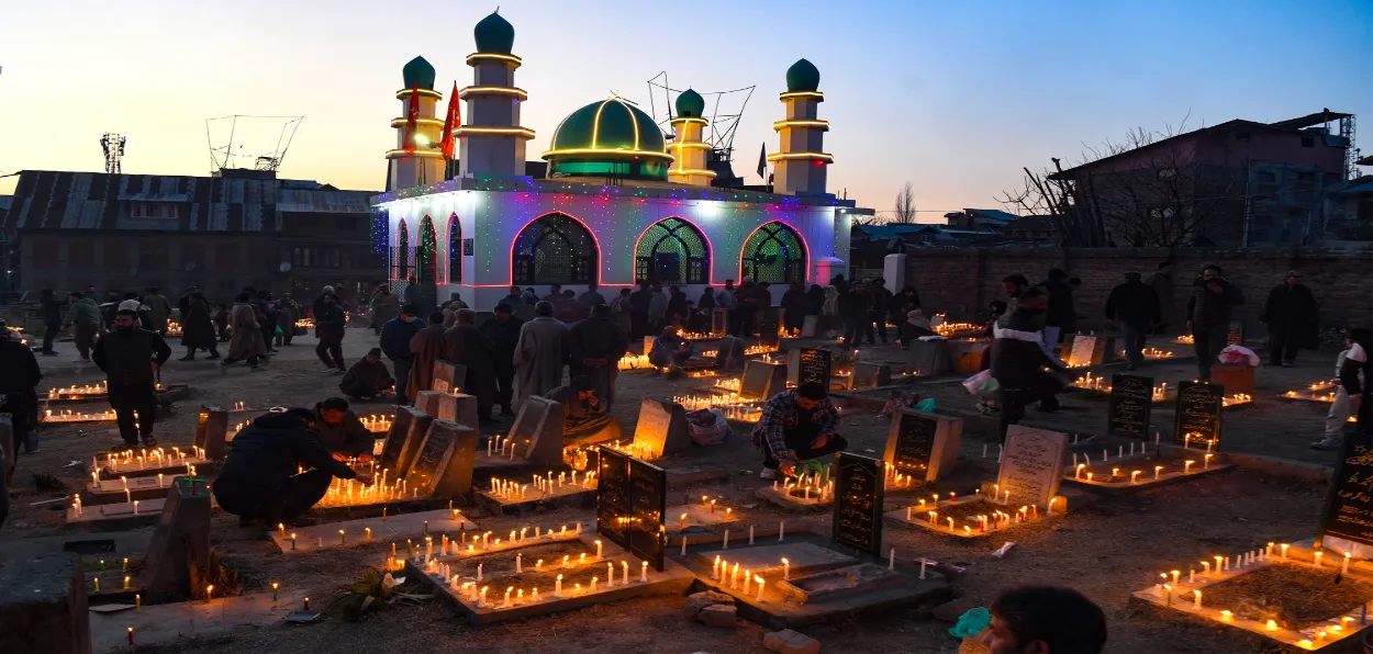 Muslims lighting graves of their loved ones on Shab-e-barat in Srinagar (Pics Basit Zargar)