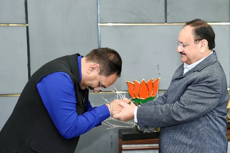 Delhi BJP President Virendra Sachdeva meets party National President and Union Minister JP Nadda after the party's victory in the Delhi Assembly elections in New Delhi