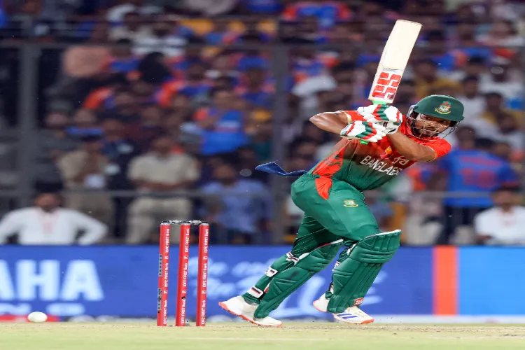 Bangladesh's Najmul Hossain Shanto plays a shot during the first T20 cricket match between India and Bangladesh