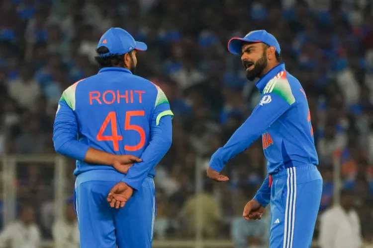 Virat Kohli in a conversation with captain Rohit Sharma during the third ODI match between India and England at Narendra Modi Stadium in Ahmedabad on February 12, 2025 