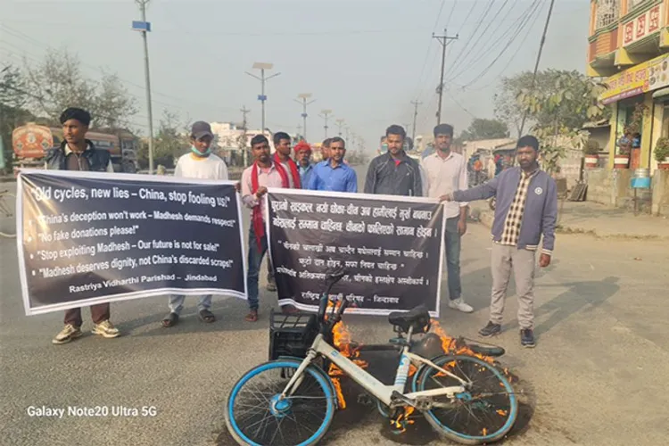 Nepali students burning substandard Chinese cycles