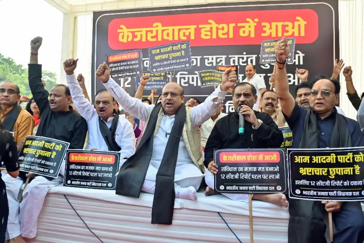 BJP MLA Vijender Gupta along with party leaders stage a protest near Delhi Chief Minister Atishi's residence demanding tabling of CAG report in the Delhi Assembly (File photo)