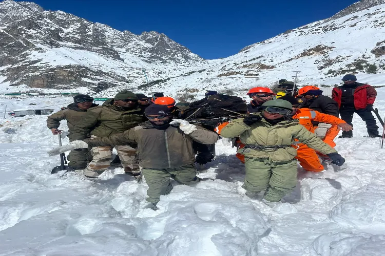 State Disaster Response Force (SDRF) team carries out search and rescue operations after an avalanche hit Mana in Chamoli district, Uttarakhand.