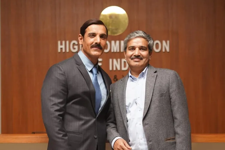 Actor John Abraham with Indian diplomat J.P. Singh