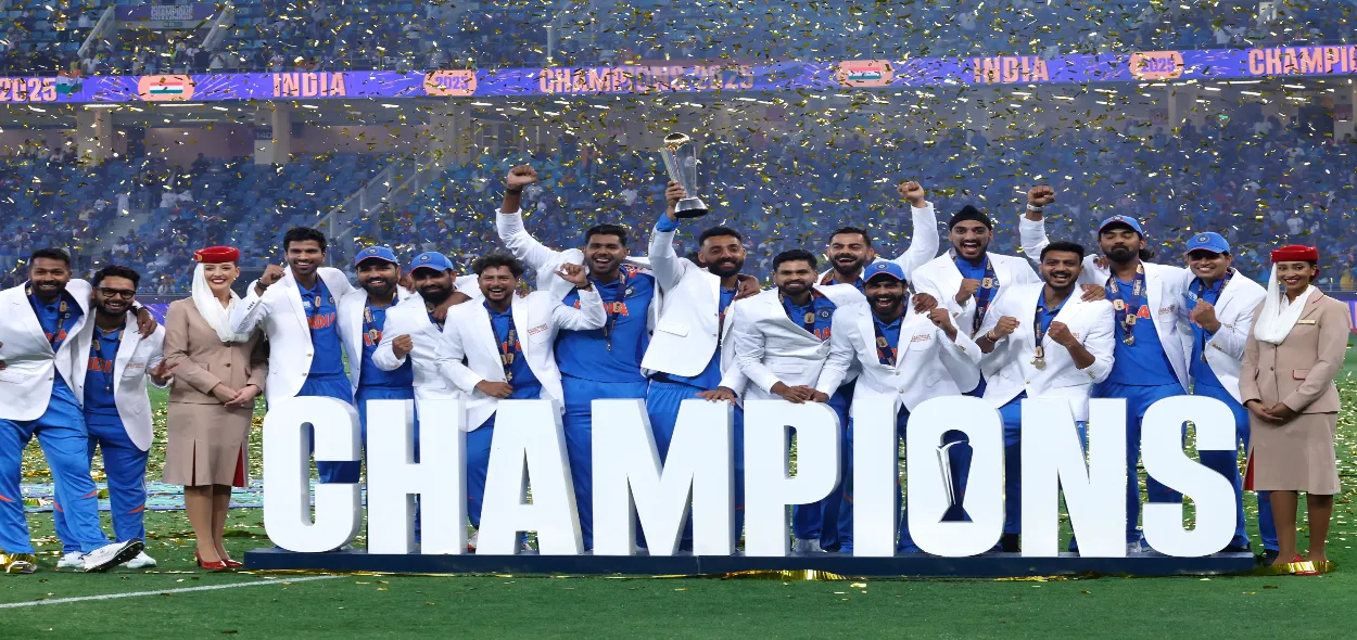 ndian players celebrate with the winners trophy on the podium after defeating New Zealand in the final cricket match of the ICC Champions Trophy at Dubai International Cricket Stadium in Dubai on Sunday