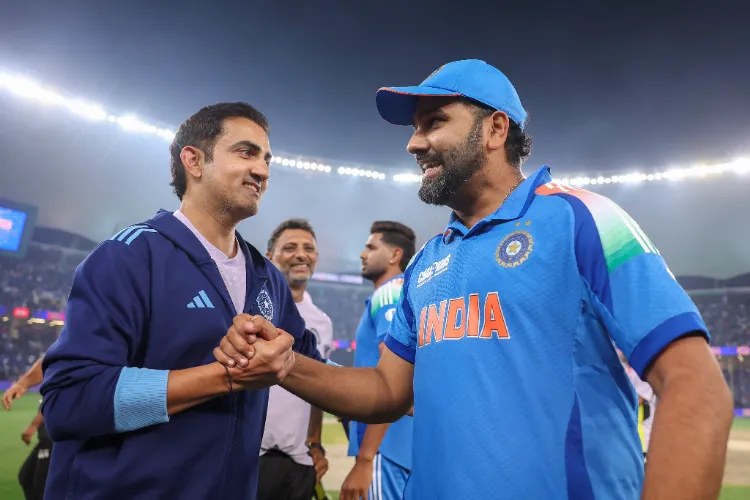 India's head coach Gautam Gambhir and captain Rohit Sharma celebrate the team's win in the ICC Champions Trophy final cricket match against New Zealand at Dubai International Cricket Stadium in Dubai on March 9, 2025