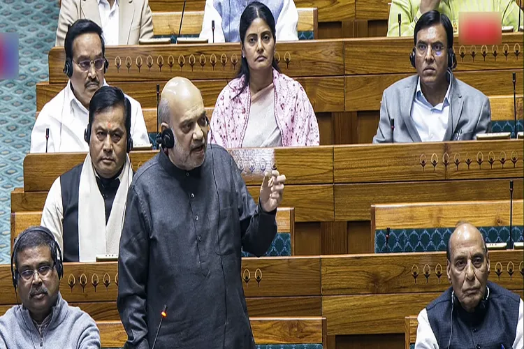 Union Home Minister Amit Shah speaks in the Lok Sabha during the Budget Session of Parliament in New Delhi on Thursday