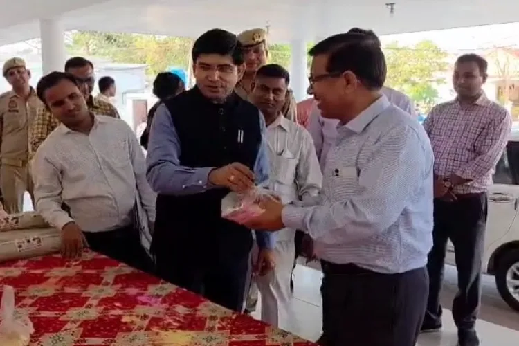 Rajender Pensiya, District Magistrate of Uttar Pradesh's Sambhal, buying herbal gulal