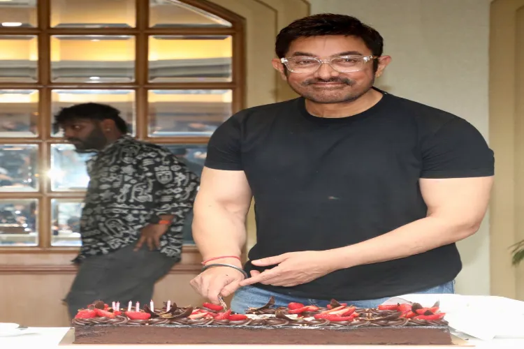 Bollywood actor Aamir Khan celebrates his 60th birthday with media and fans in Mumbai on March 13, 2025