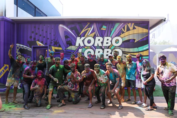 Kolkata Knight Riders players and coaching staff celebrate Holi at training camp in Kolkata on Friday