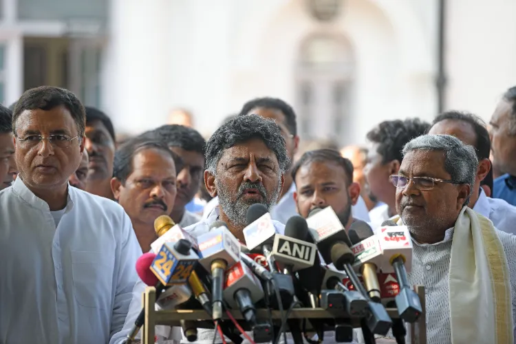 Congress leader DK Shivakumar along with party leaders Siddaramaiah and Randeep Singh Surjewala addresses the media (File photo)