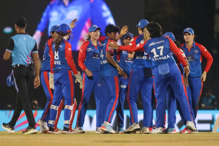 Delhi Capitals celebrate the dismissal of Nat Sciver-Brunt during the WPL 2025