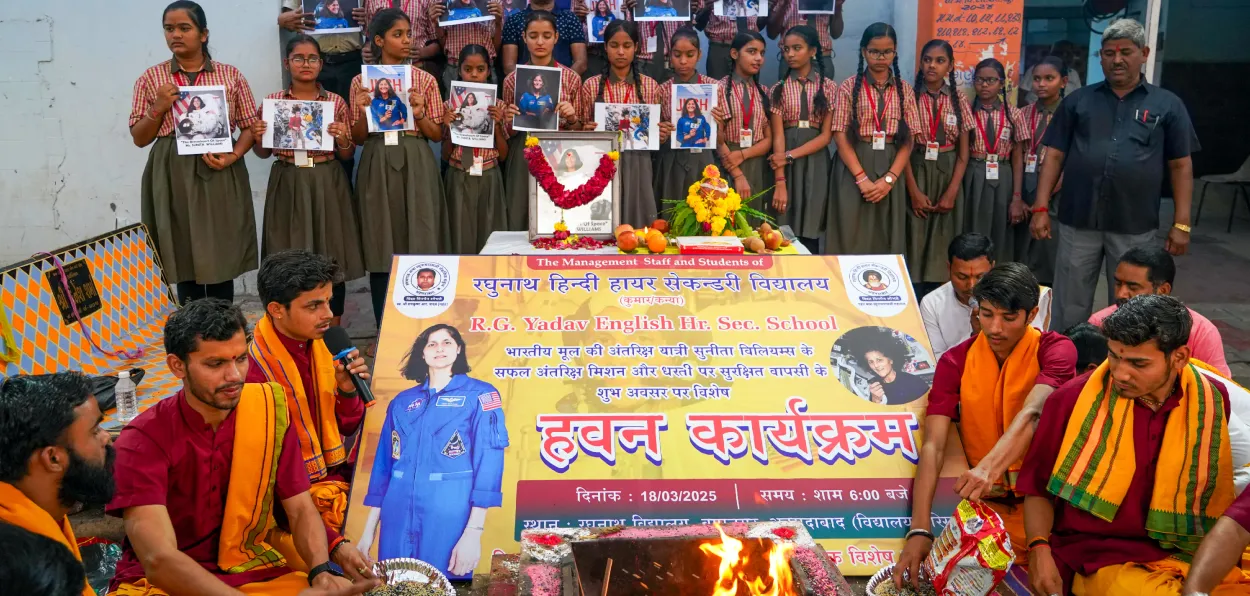 Students of a local school in Ahmedabad offering Prayers and Yajnya for safe return of Sunita Williams and others from ISS on earth