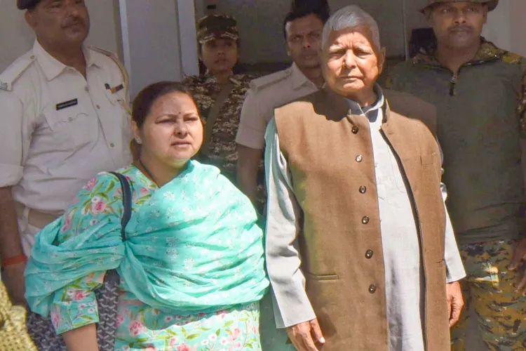 Rashtriya Janata Dal (RJD) chief Lalu Prasad Yadav, along with party MP Misa Bharti, arrives at the Enforcement Directorate office for questioning in the land-for-jobs money laundering case in Patna on Wednesday, March 19, 2025.