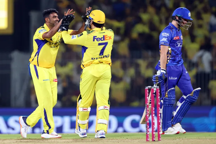 M S Dhoni and Rachin of CSK celebrate  the wicket of Mumbai Indians Will Jacks during their Indian Premier League 2025 match, at MA Chidambaram Stadium in Chennai 