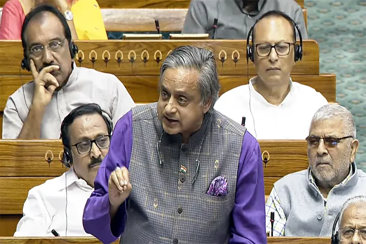 Congress MP Shashi Tharoor speaks in Lok Sabha during the Budget Session of the Parliament in New Delhi